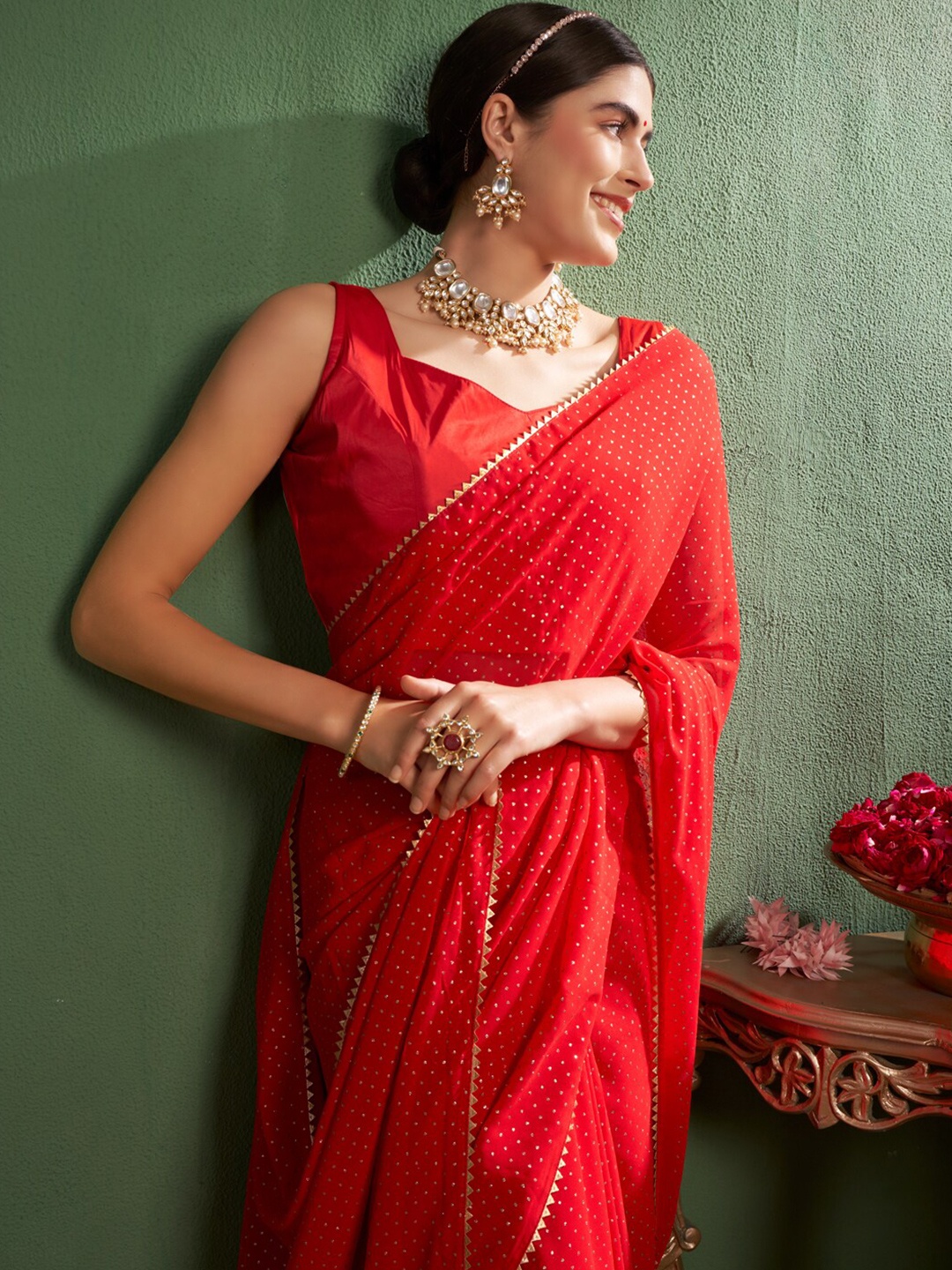 

Sangria Embellished Mukaish Pure Georgette Sarees, Red
