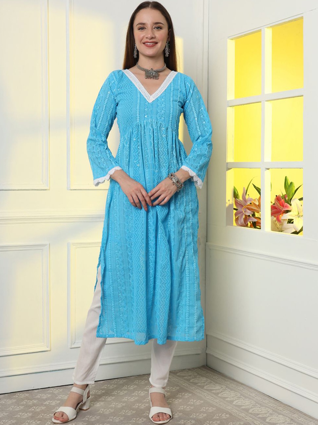 

KALINI Paisley Embroidered V-Neck Three-Quarter Sleeves Thread Work Kurta with Trousers, Turquoise blue