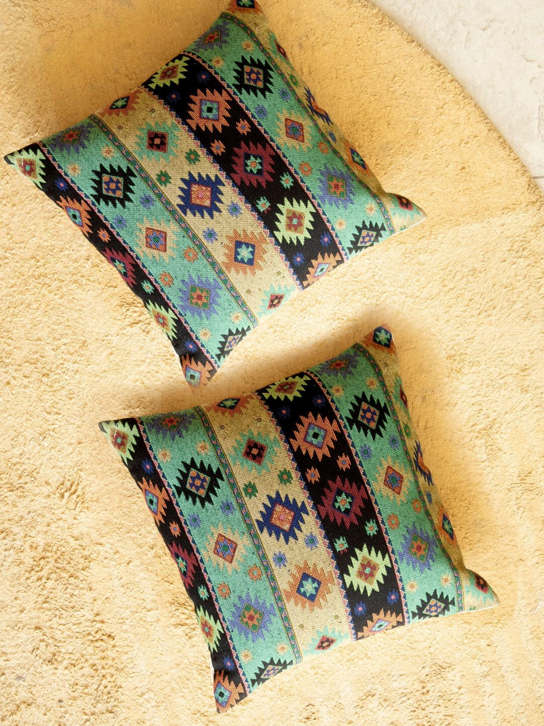 

Aura Green & Navy Blue 2 Pieces Ethnic Motifs Square Cushion Covers