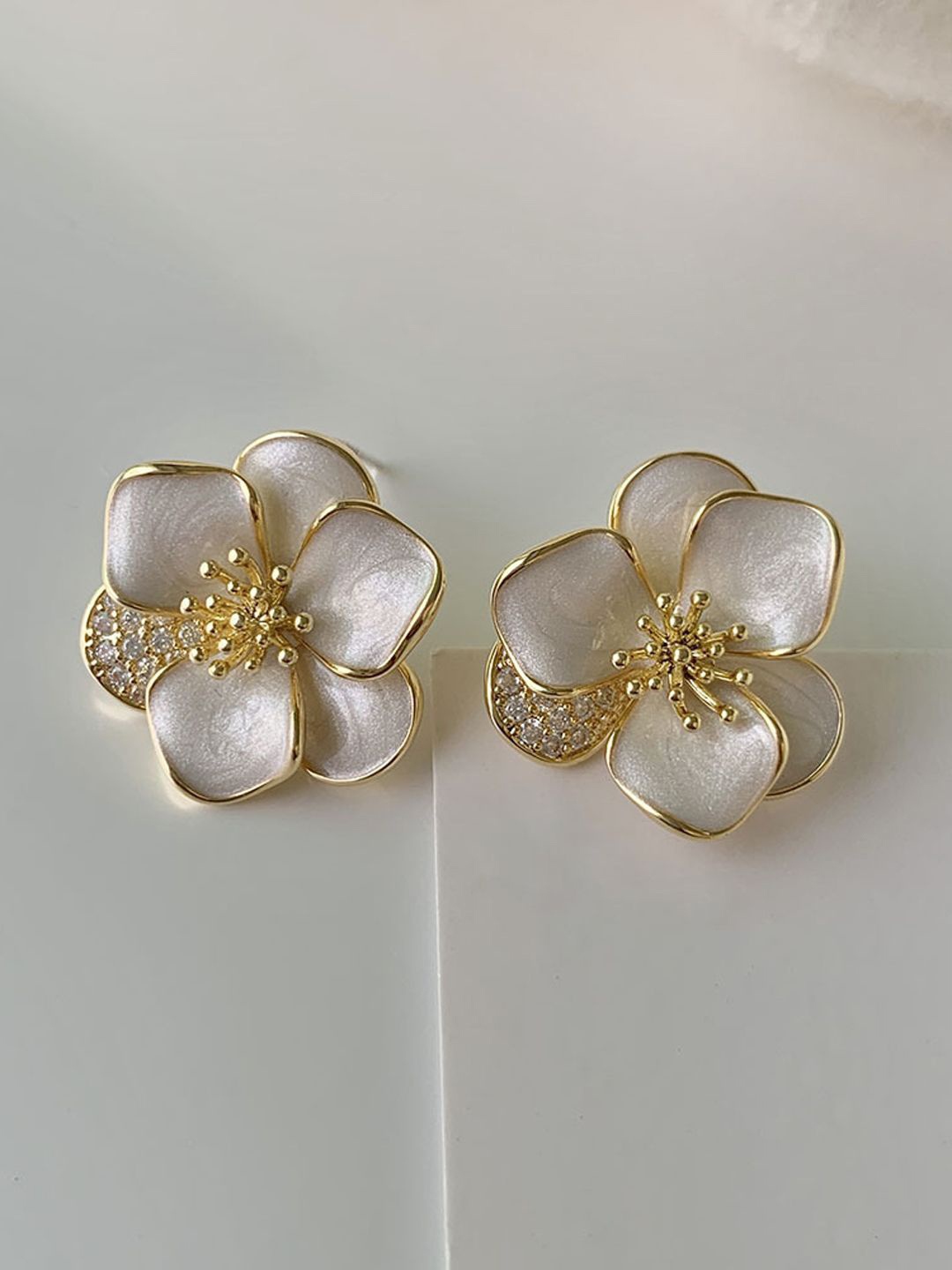 

VAGHBHATT Stainless Steel Stones Studded Floral Studs Earrings, Gold