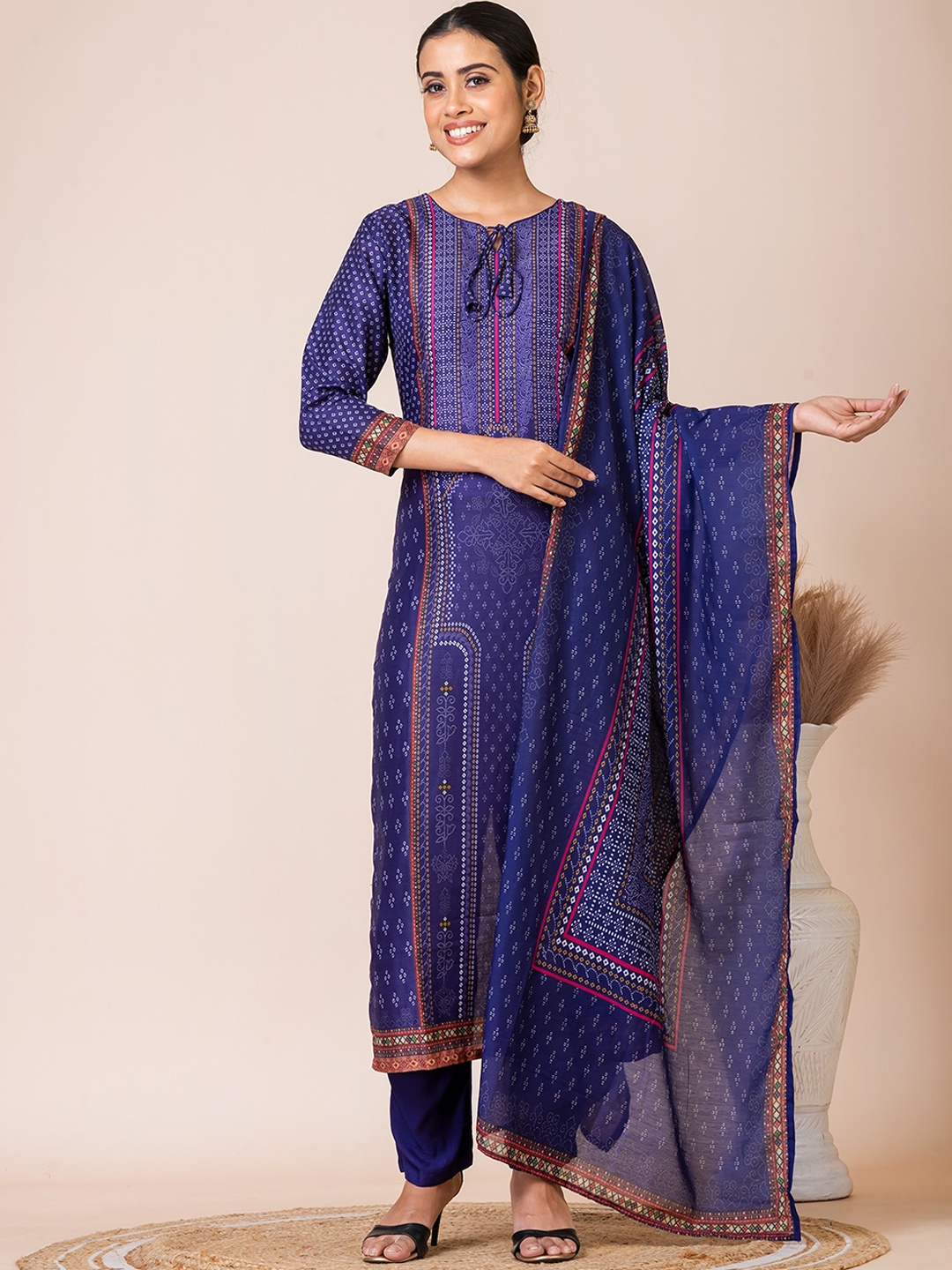 

SARSO Ethnic Motifs Printed Tie-Up Neck Regular Kurta with Trousers & Dupatta, Purple