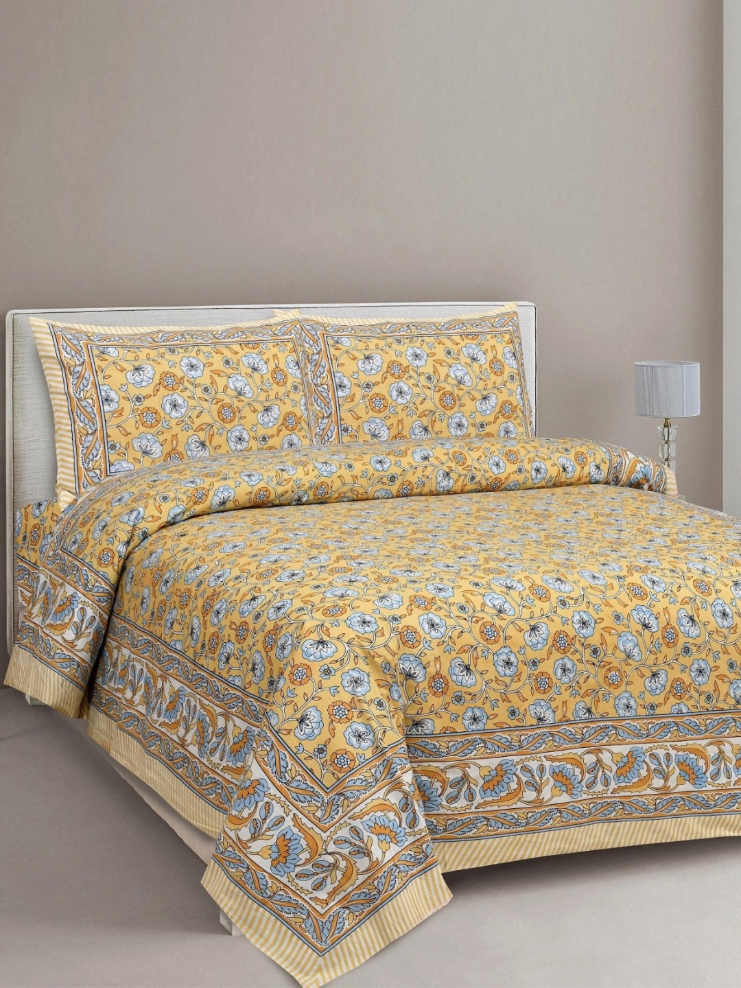 

Aura Yellow & Blue Ethnic Motifs 144 TC King Bedsheet with 2 Pillow Covers