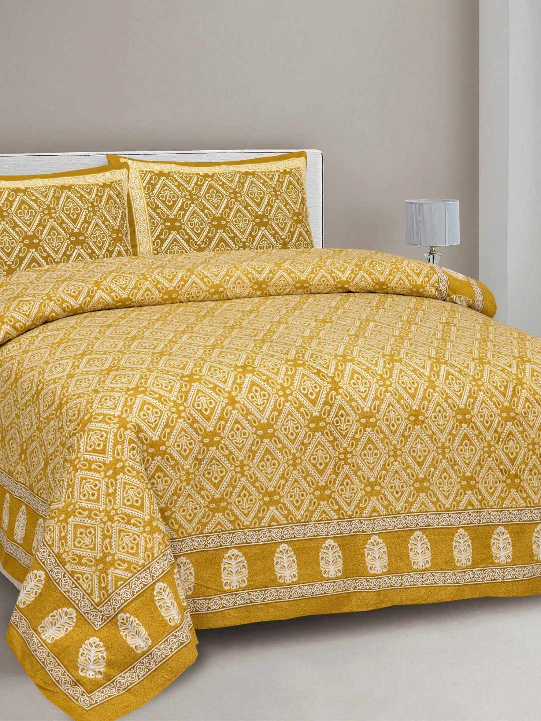 

Aura Yellow & White Ethnic Motifs 144 TC King Bedsheet With 2 Pillow Covers