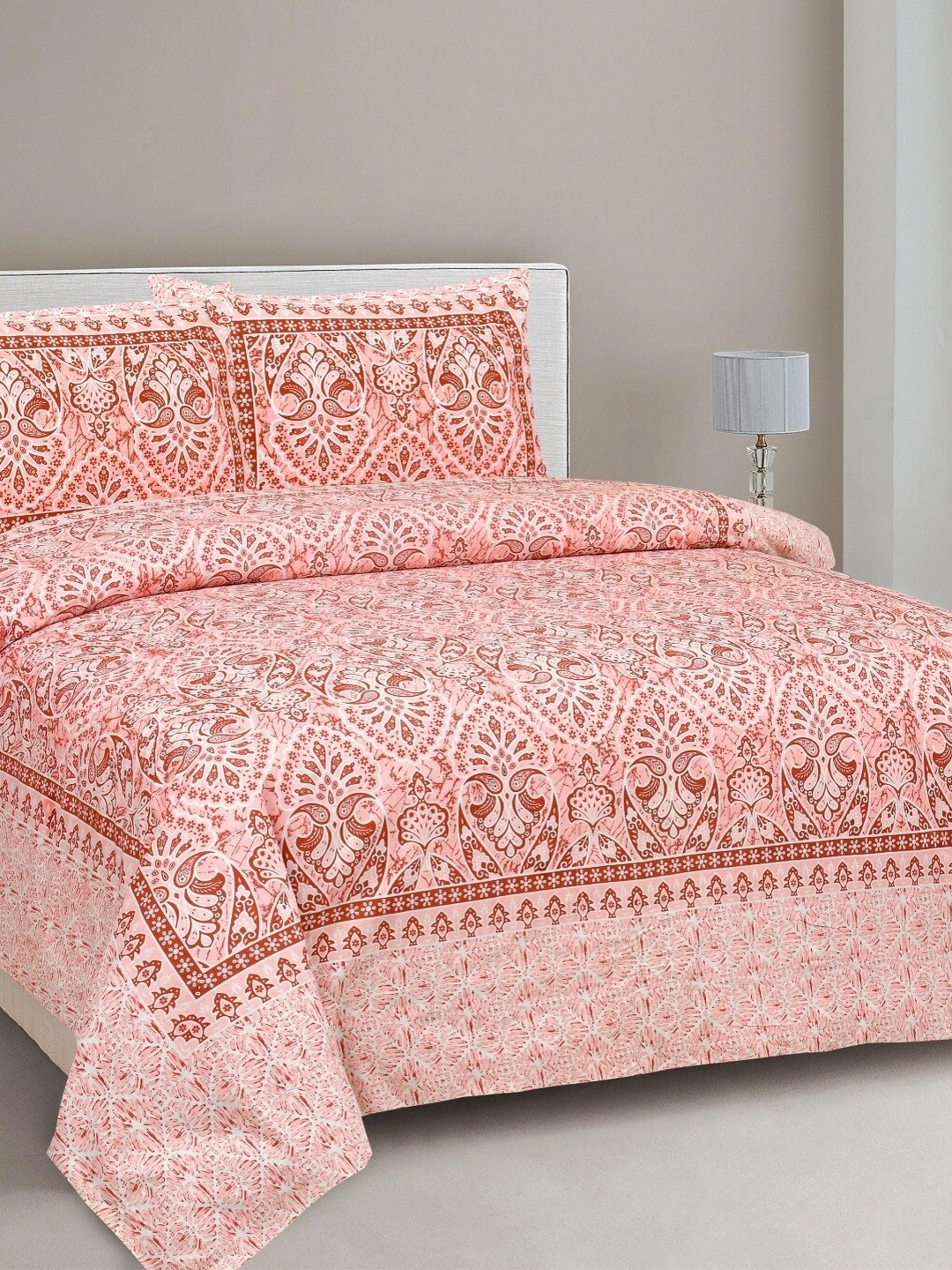 

Aura Orange & White Ethnic Motifs 144 TC King Bedsheet With 2 Pillow Covers