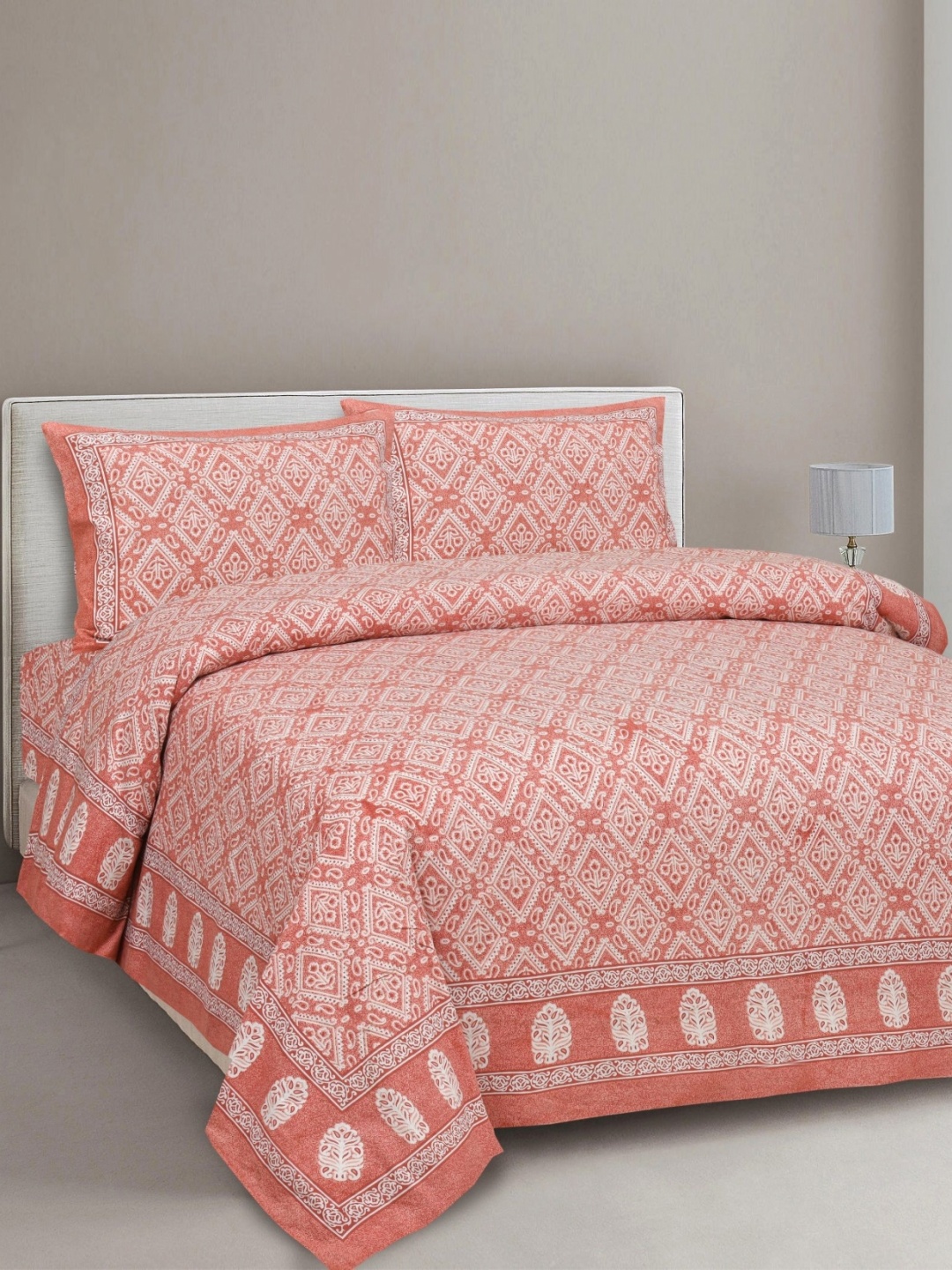 

Aura Orange & White Ethnic Motifs 144 TC King Bedsheet With 2 Pillow Covers