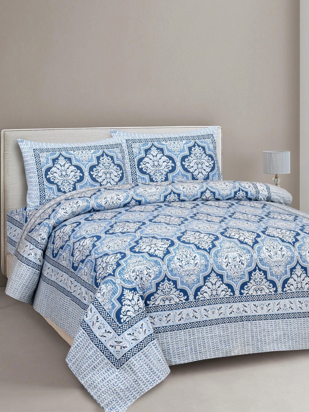 

Aura Blue & White Ethnic Motifs 144 TC King Bedsheet With 2 Pillow Covers