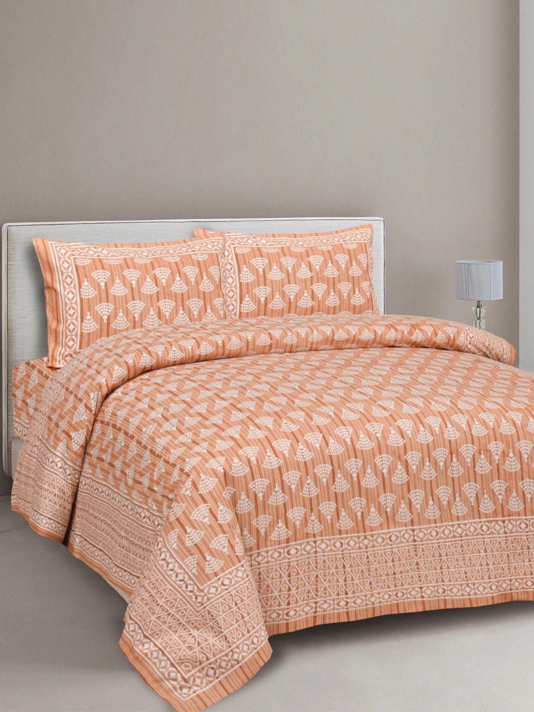 

Aura Orange & White Ethnic Motifs 144 TC King Bedsheet With 2 Pillow Covers