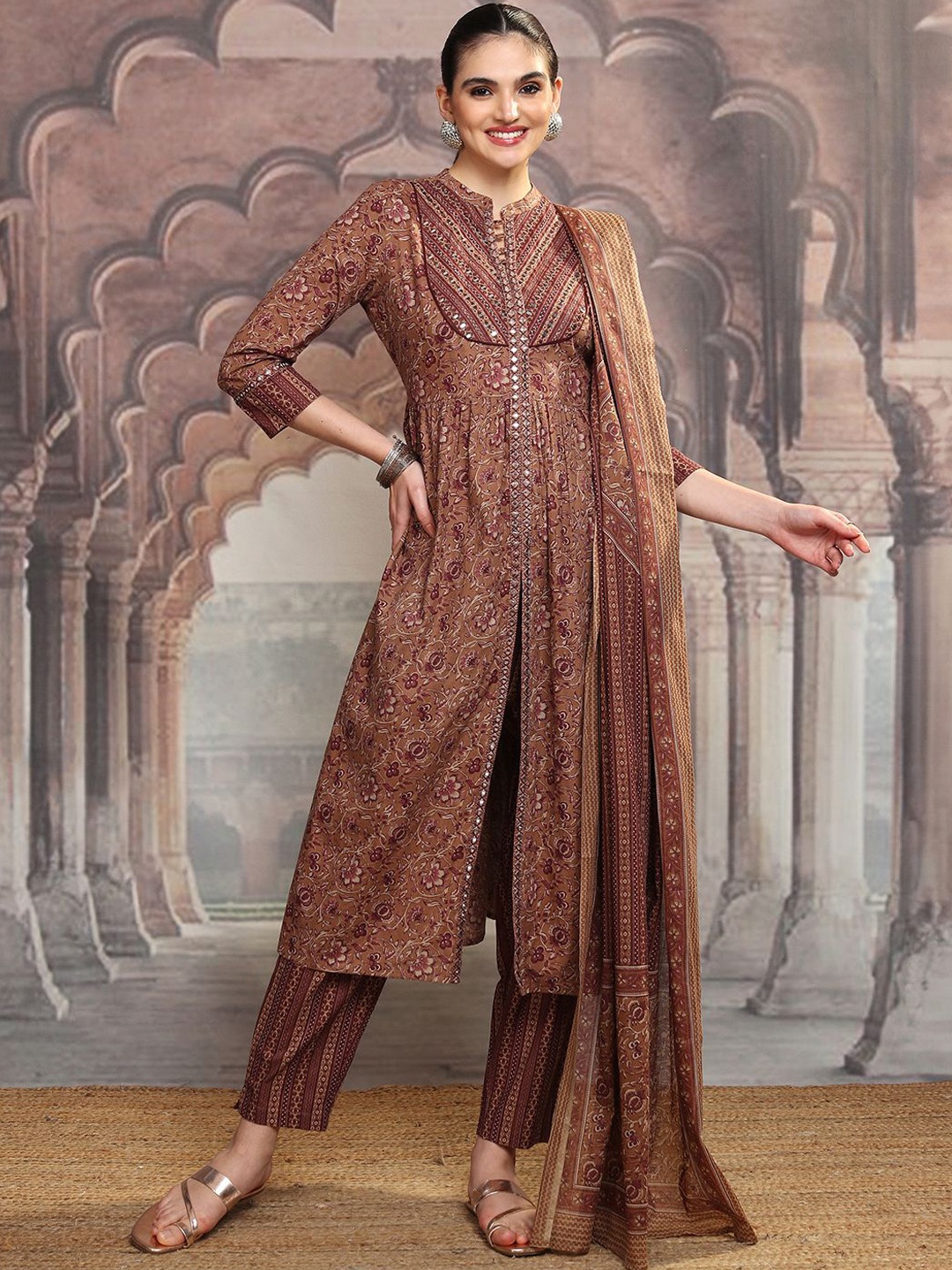 

Vishudh Brown Printed Mandarin Collar Pure Cotton Anarkali Kurta With Trousers & Dupatta