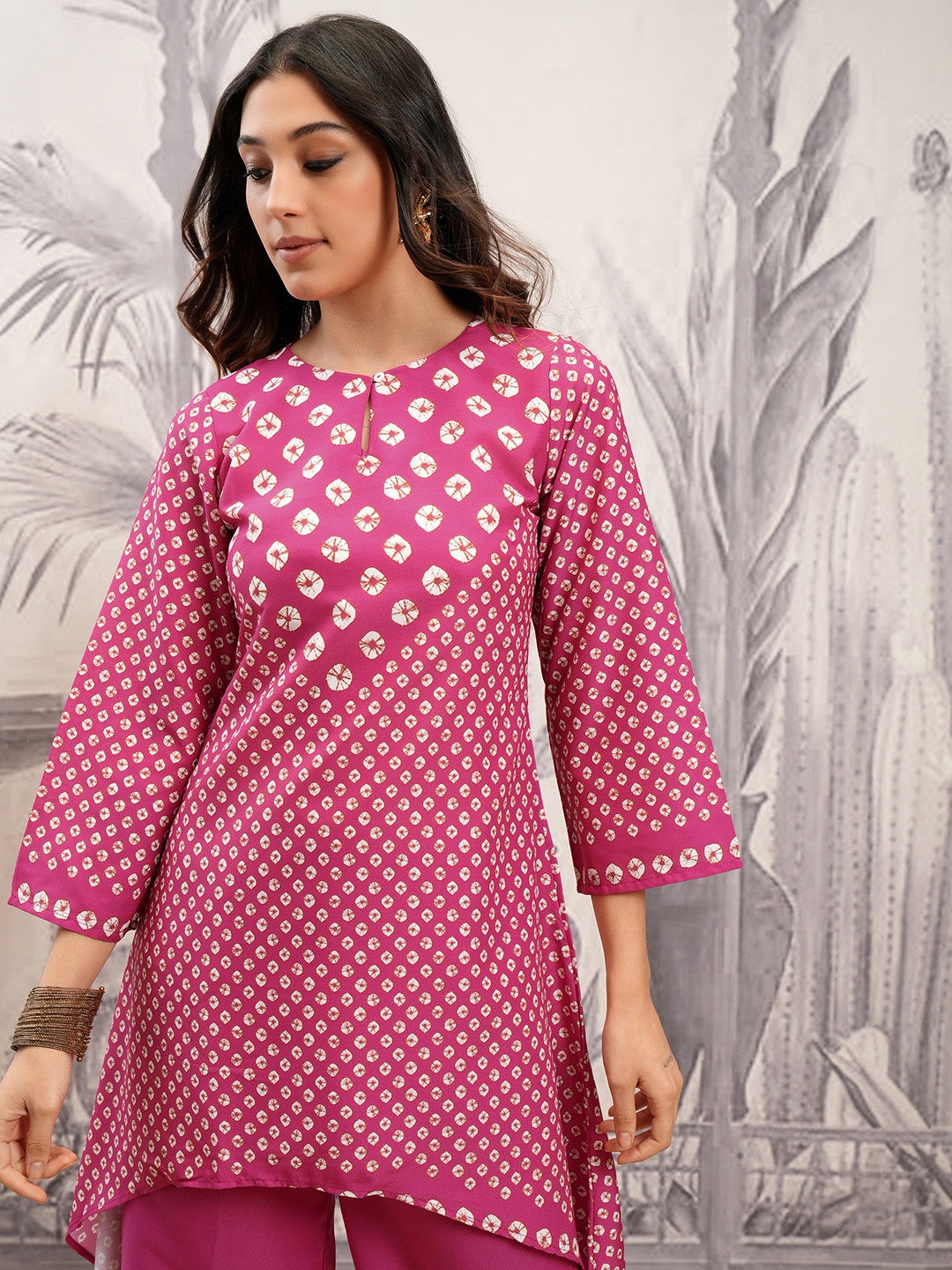 

Vishudh Pink Ethnic Motifs Printed Keyhole Neck A-Line Kurta With Palazzos