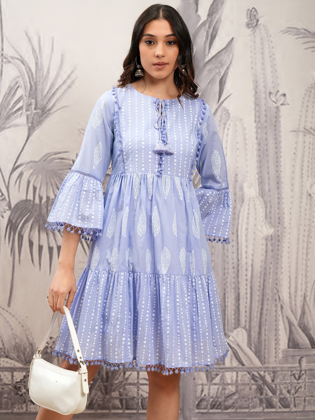 

Vishudh Purple Printed Tie-Up Neck Flared Sleeves Cotton Gathered Tiered Fit & Flare Dress