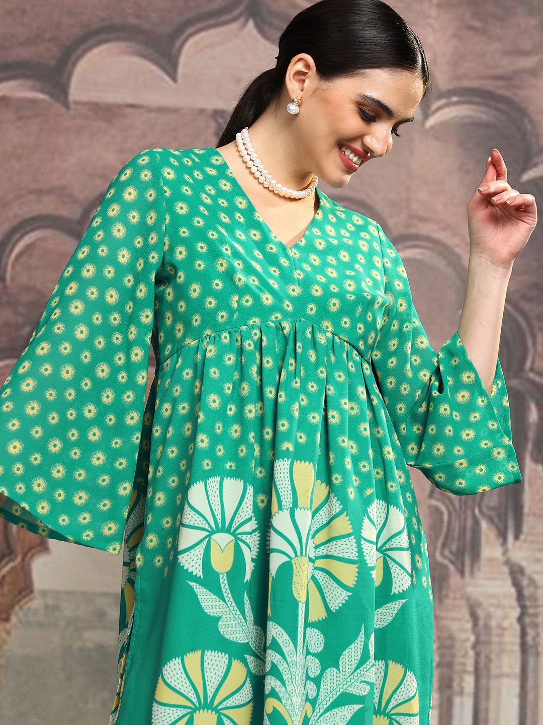 

Vishudh Green Floral Printed V-Neck Flared Sleeves Empire A-Line Kurta
