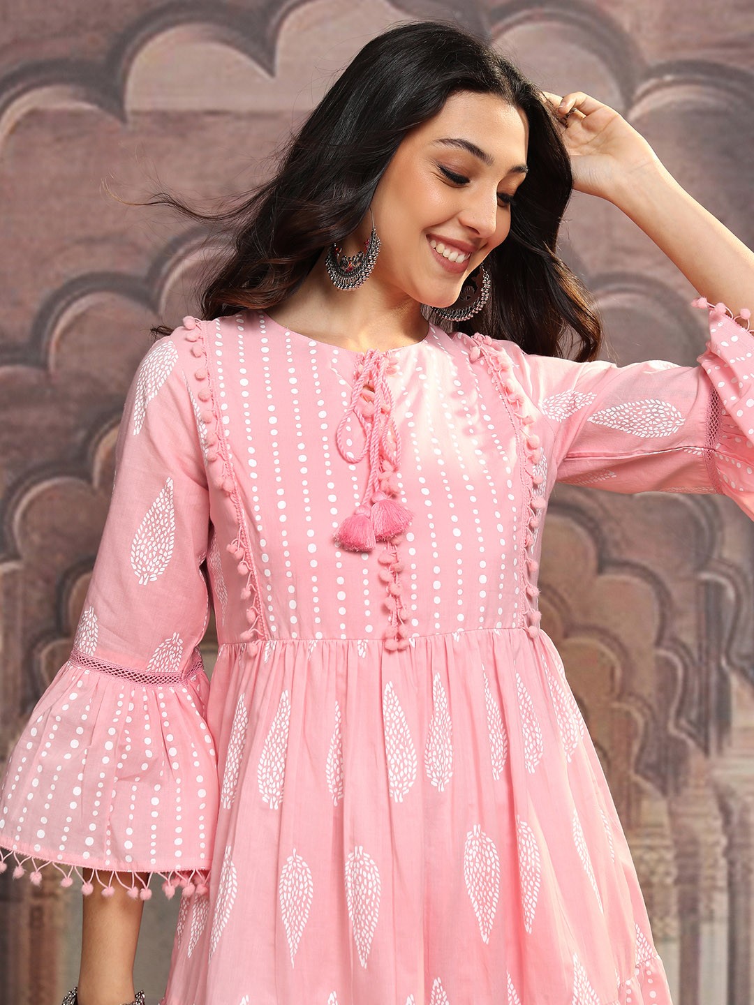 

Vishudh Pink Printed Tie-Up Neck Bell Sleeves Gathered Cotton Fit & Flare Dress
