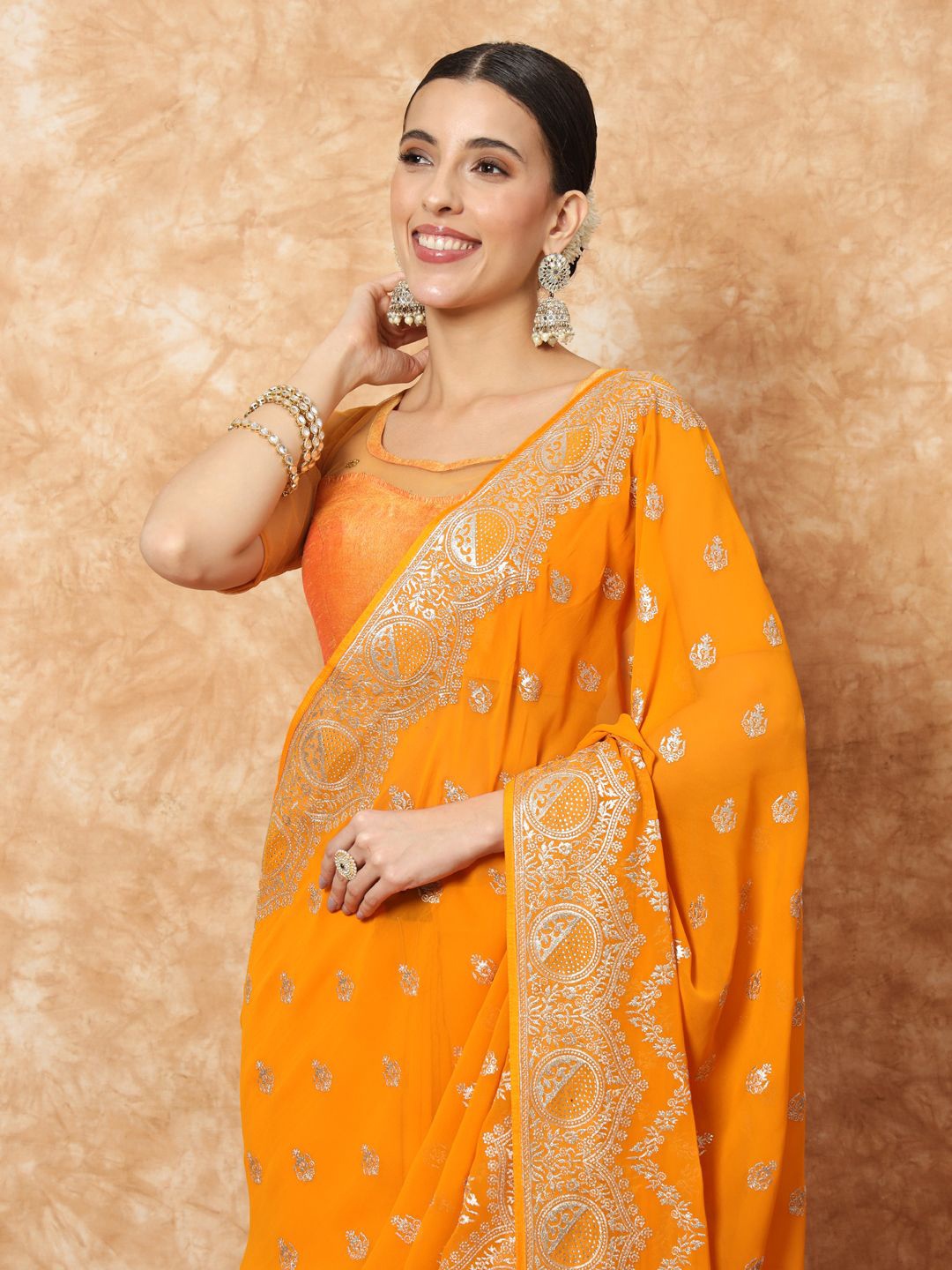 

Chhabra 555 Ethnic Motif Embellished Sarees, Mustard