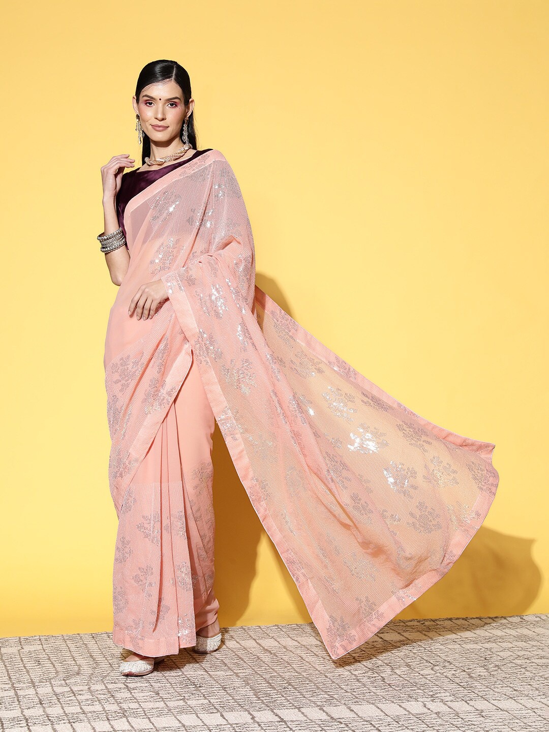 

Ishin Ethnic Motifs Sequinned Saree, Peach