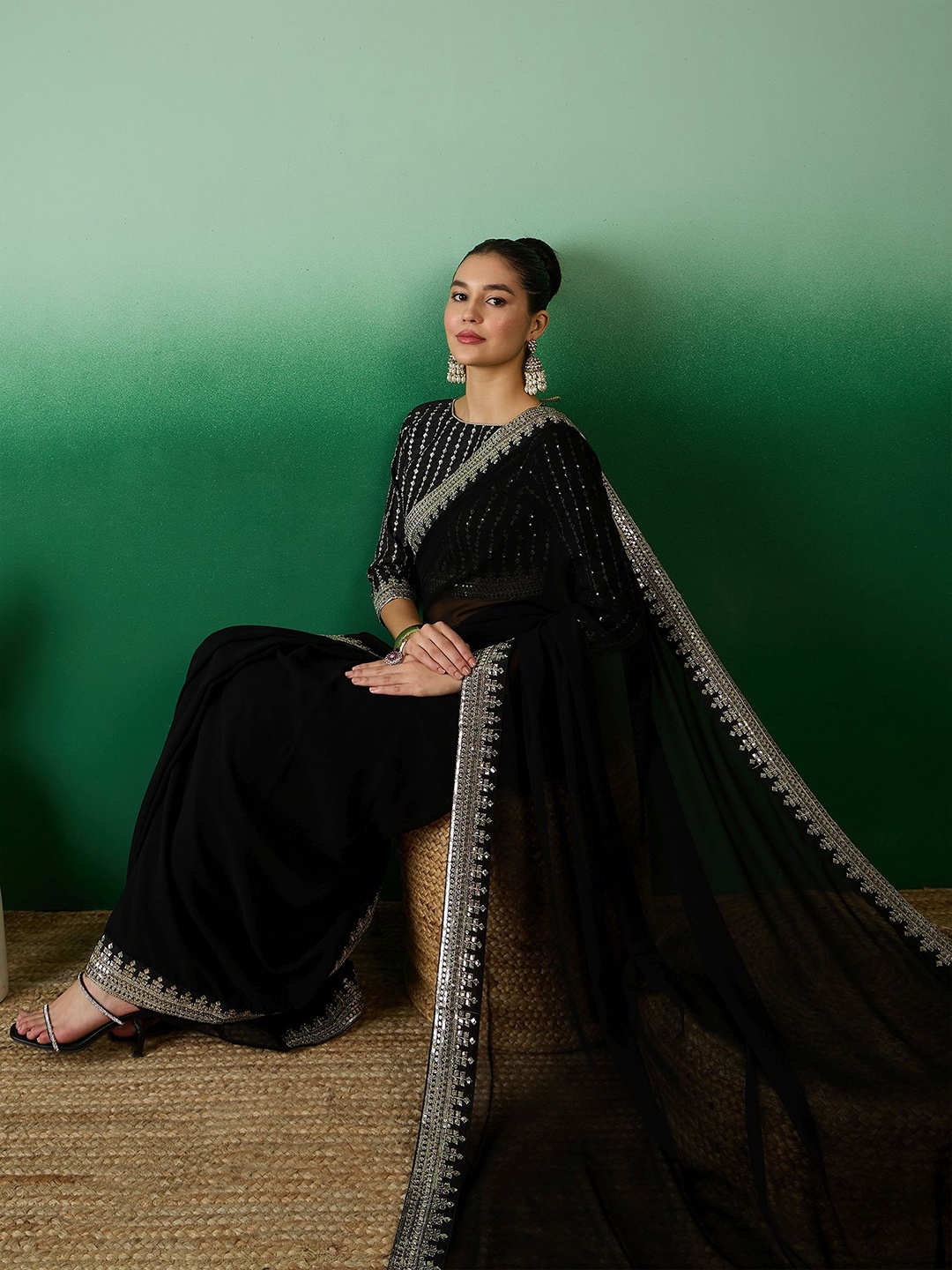 

Sangria Sequined Pure Georgette Sarees, Black