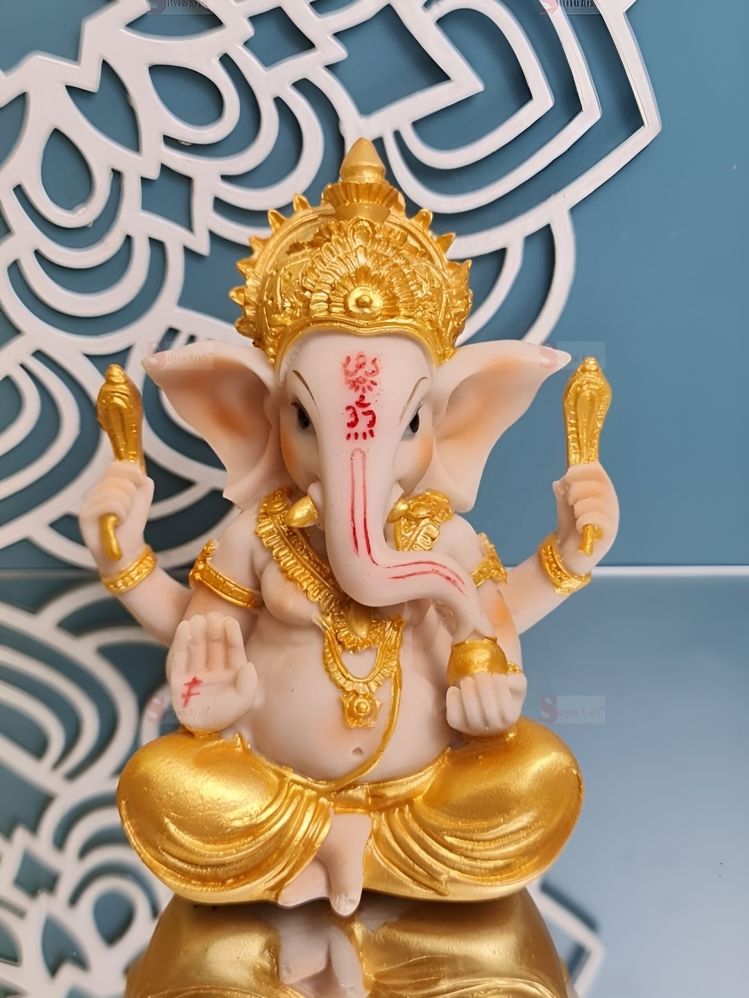 

Satyam Kraft Gold-Toned & Nude Ganesh Religious Figurine Showpiece
