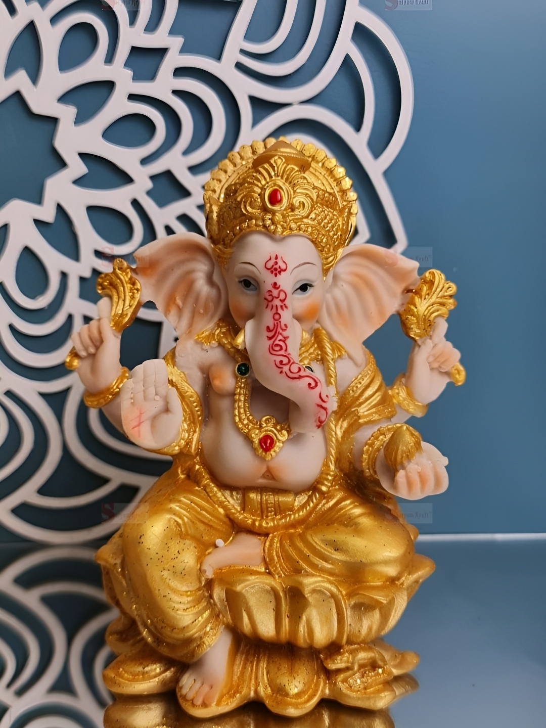 

Satyam Kraft Gold-Toned & Nude Ganesh Religious Figurine Showpiece