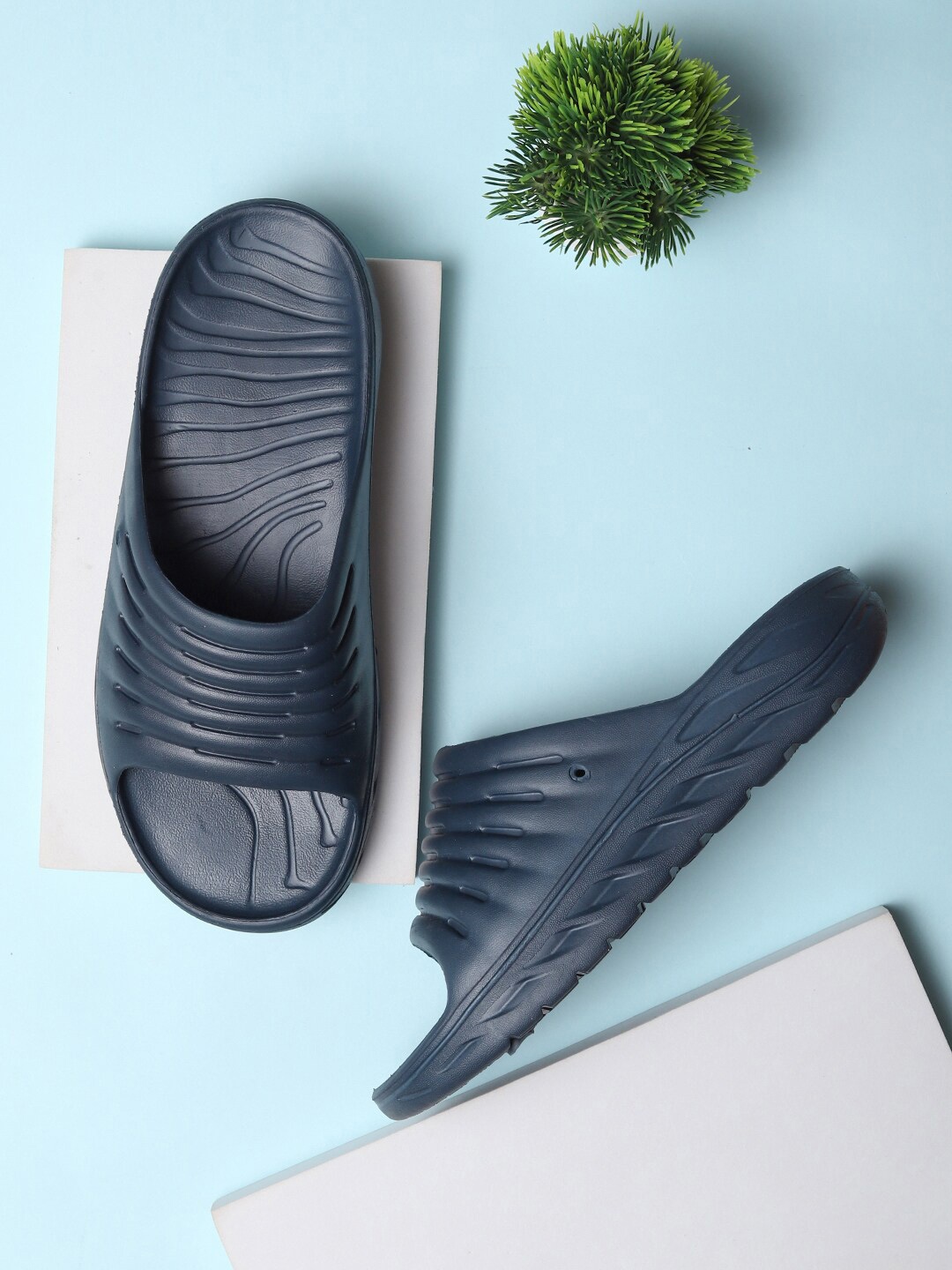 

The Roadster Lifestyle Co. Navy Blue Self Design Sliders