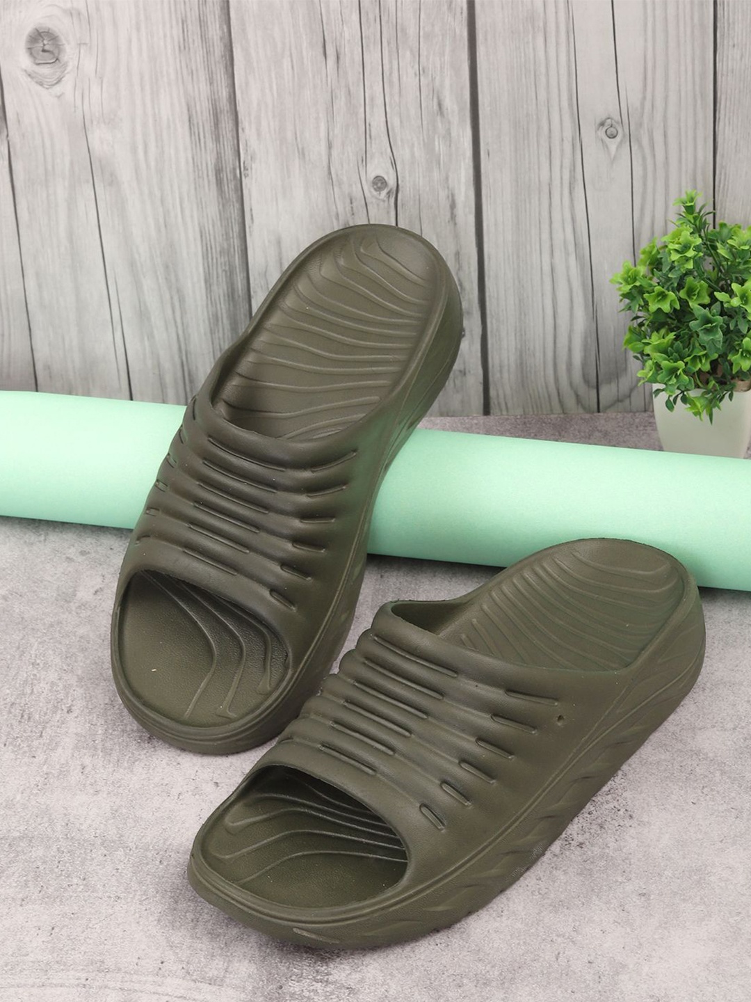 

The Roadster Lifestyle Co. Men Self Design Sliders, Olive