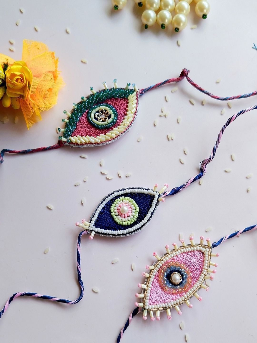 

Sangria Men Set Of 3 Evil Eye Beaded Thread Rakhis, Pink