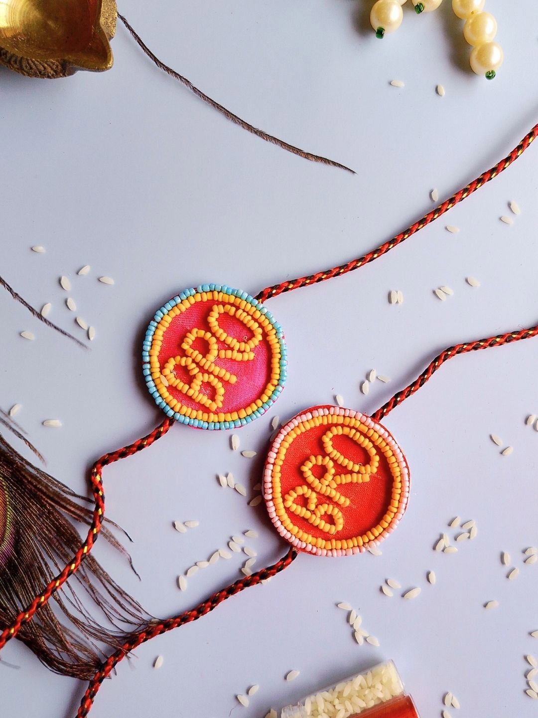 

Sangria Men Set Of 2 Beaded Thread Rakhis, Red