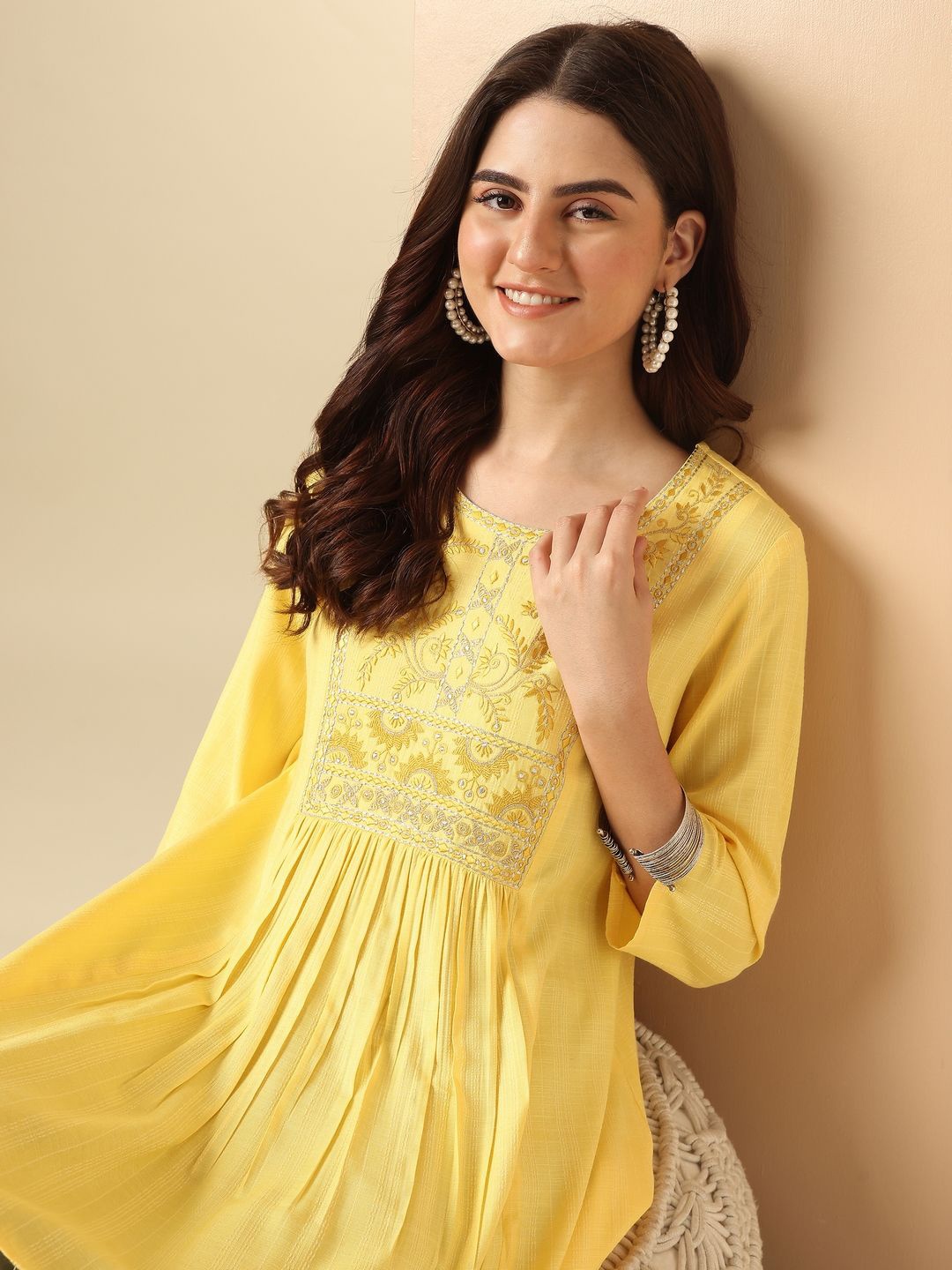 

Anouk Round Neck Self Design Embroidered A-Line Top, Yellow