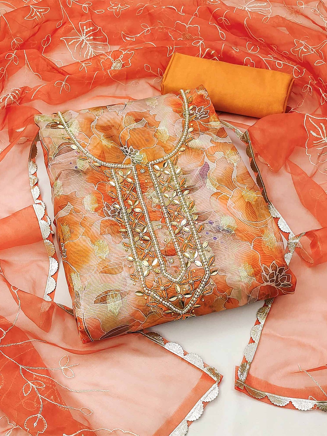 

Peachmode Printed Organza Unstitched Dress Material, Orange