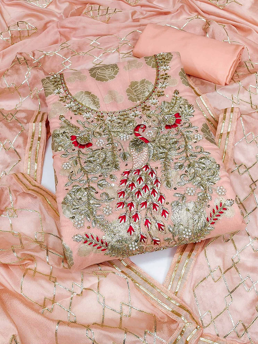 

Peachmode Woven Design Unstitched Dress Material, Peach