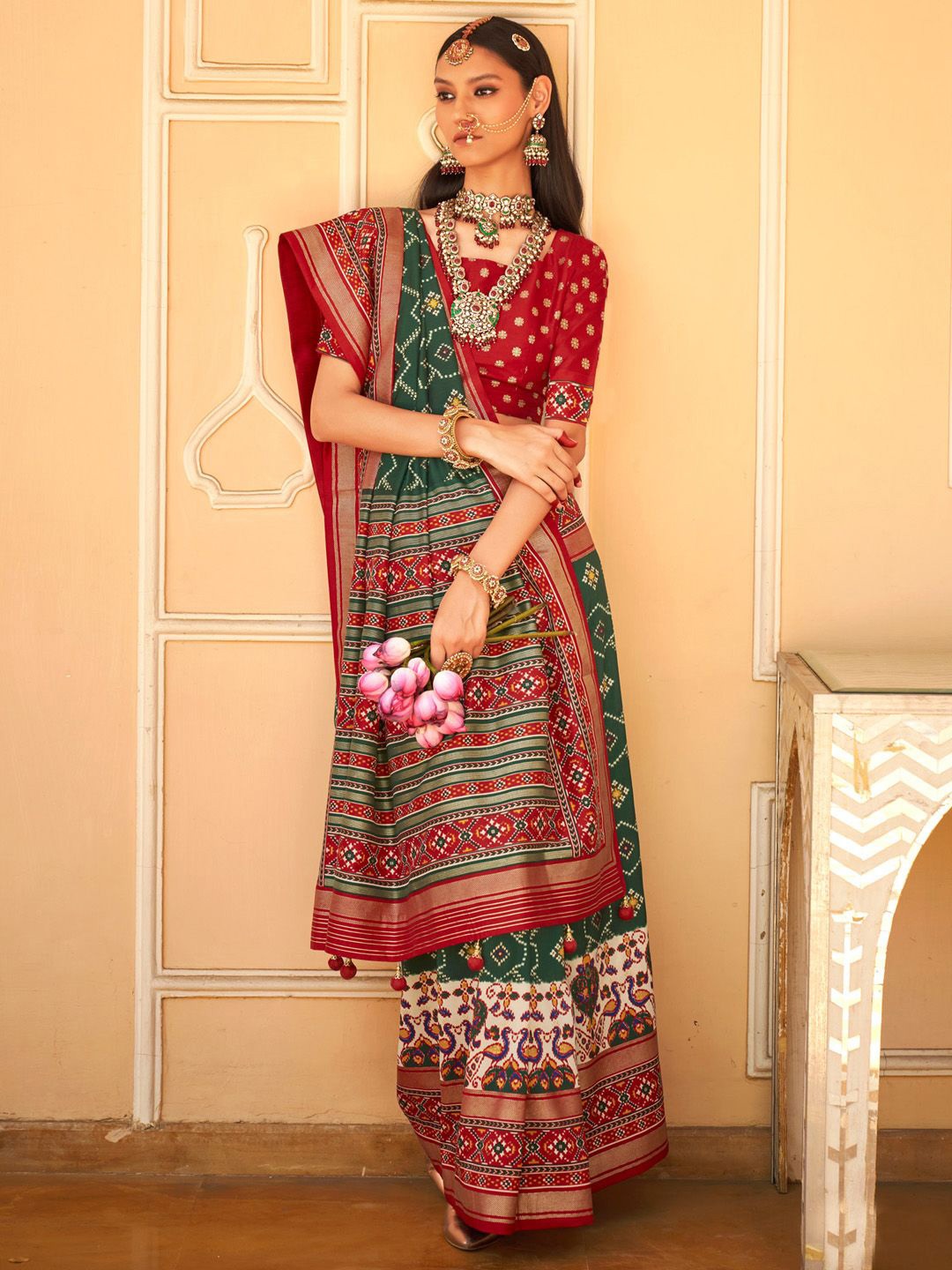 

Anouk Ethnic Motifs Zari Patola Saree, Green