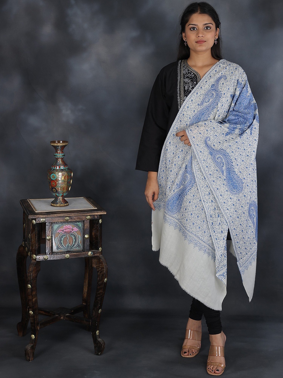 

Exotic India Ivory And Blue Pure Wool Sozni Hand Embroidered Paisley Kashmiri Tusha Stole, Off white