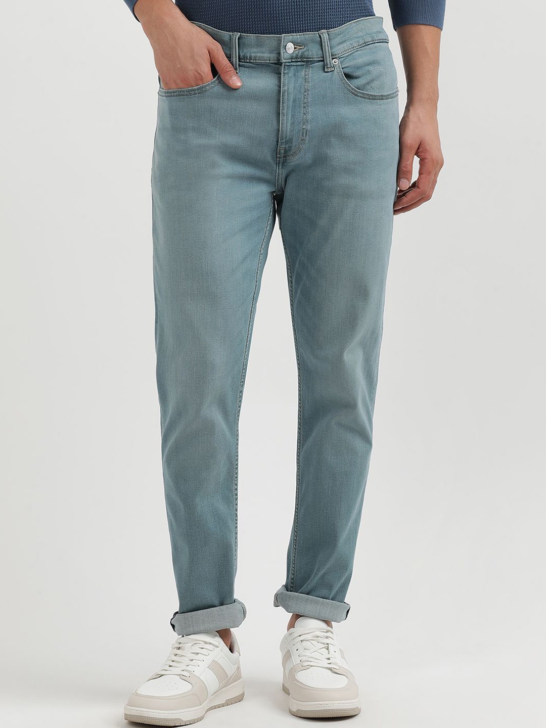 

Tommy Hilfiger Men Mid-Rise Light Fade Jeans, Blue