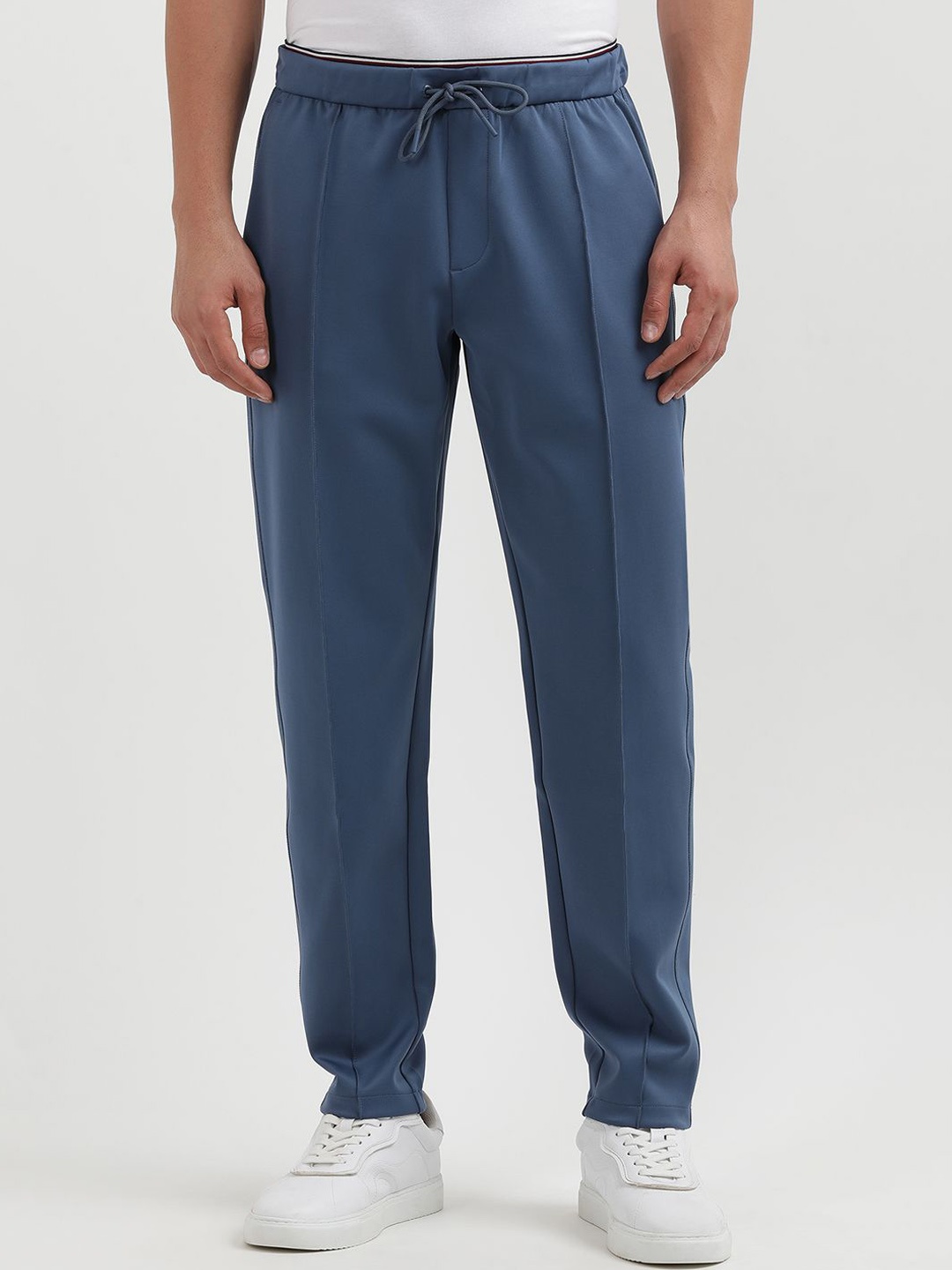 

Tommy Hilfiger Men Mid-Rise Regular Casual Track Pants, Blue