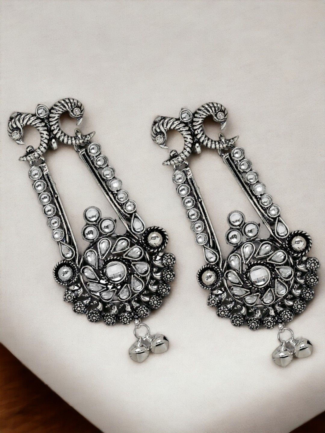 

Sangria Silver-Toned Kundan-Studded Contemporary Drop Earrings