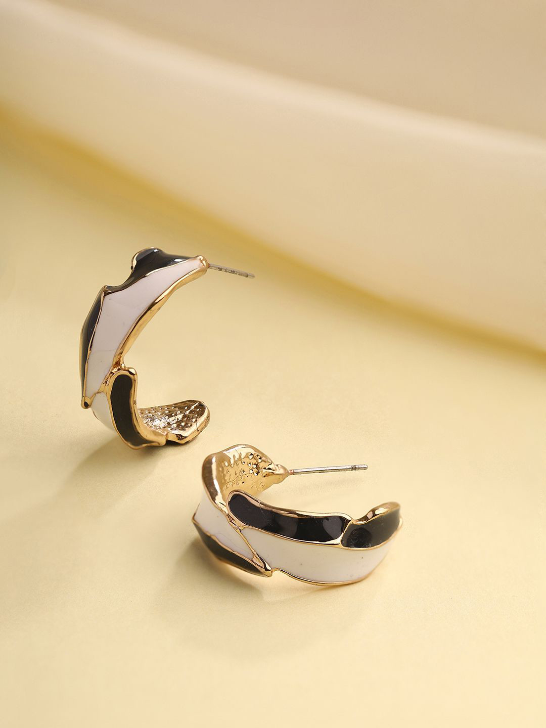 

Priyaasi Gold Plated Half Hoop Earrings