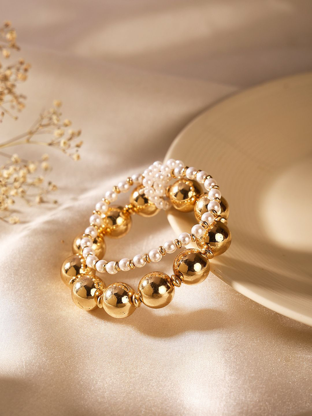 

Priyaasi Gold-Plated Pearls-Beaded Elasticated Bracelet