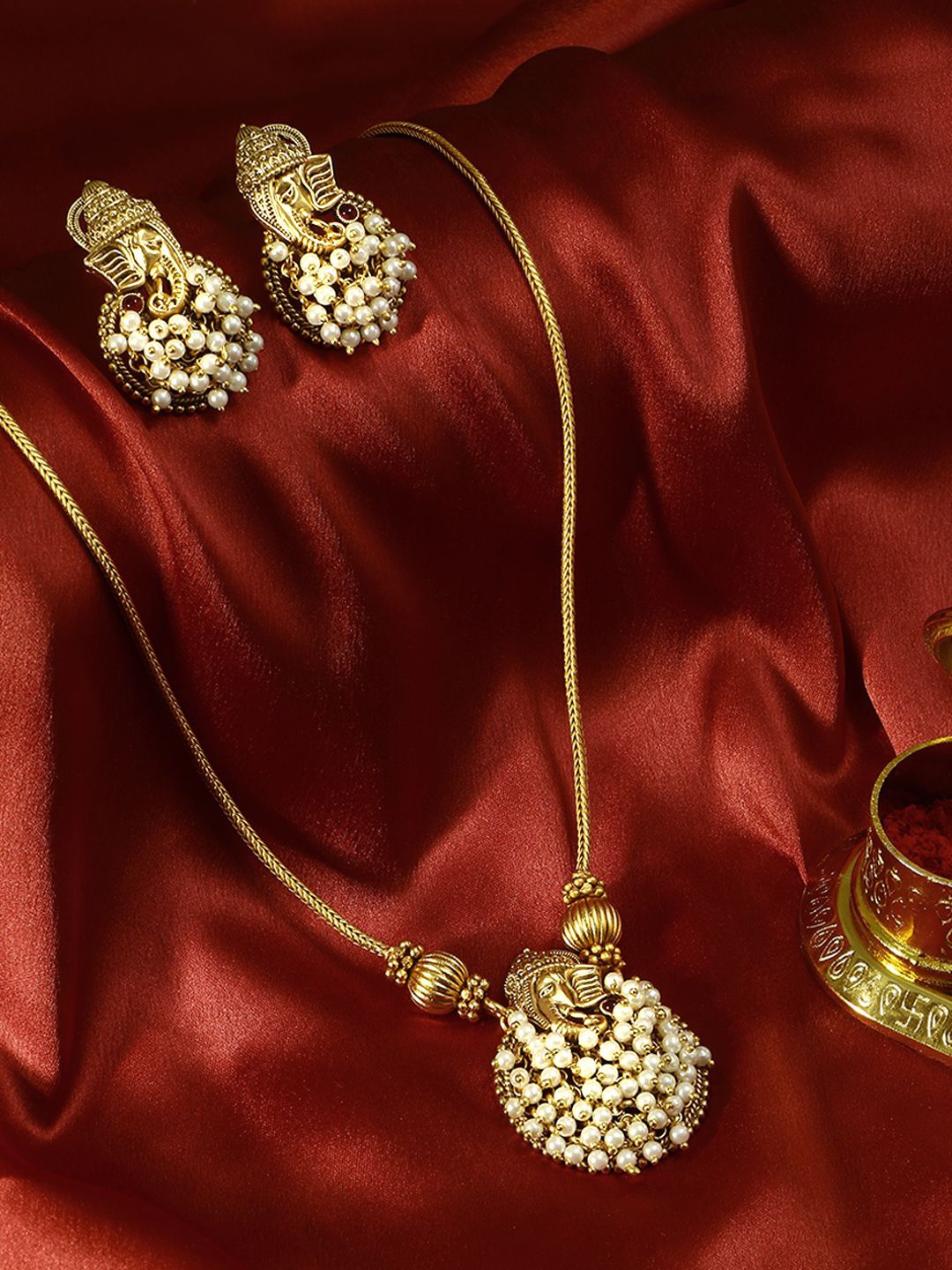 

Adwitiya Collection Gold Plated Artificial Stones and Beads Studded Jewellery Set
