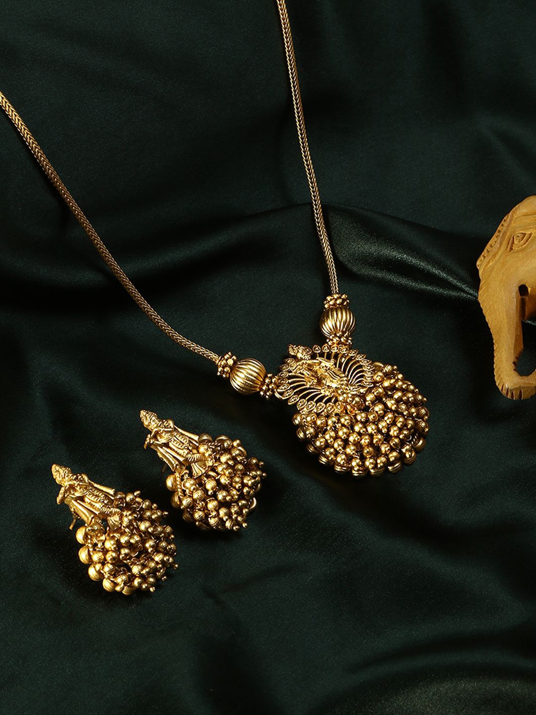 

Adwitiya Collection Gold Plated Artificial Stones and Beads Studded Jewellery Set