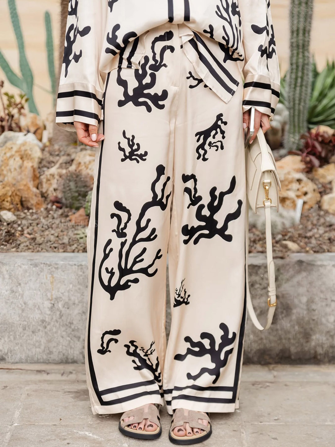 

LULU & SKY Women White Abstract Printed Straight Fit Trousers