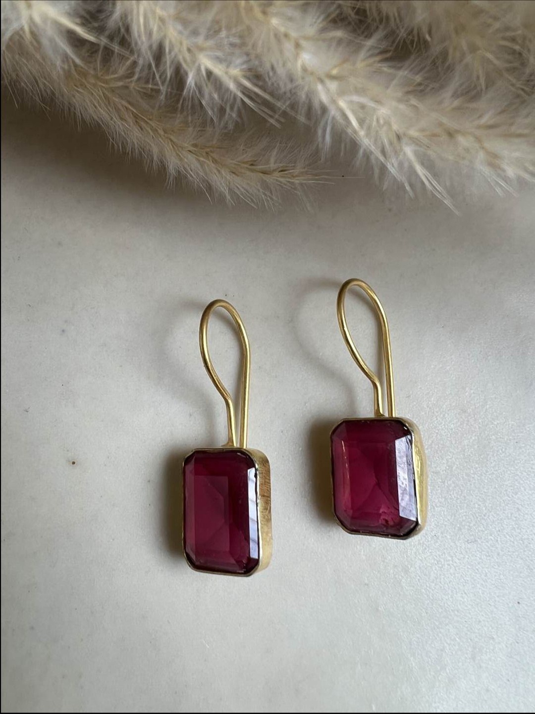 

XAGO Artificial Stones Gold Plated Drop Earrings