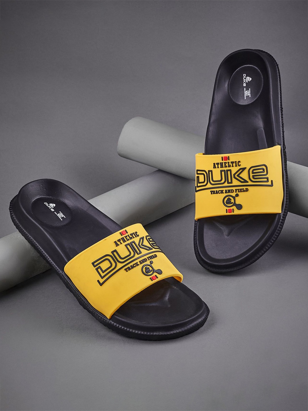 

Duke Men Printed Rubber Sliders, Yellow