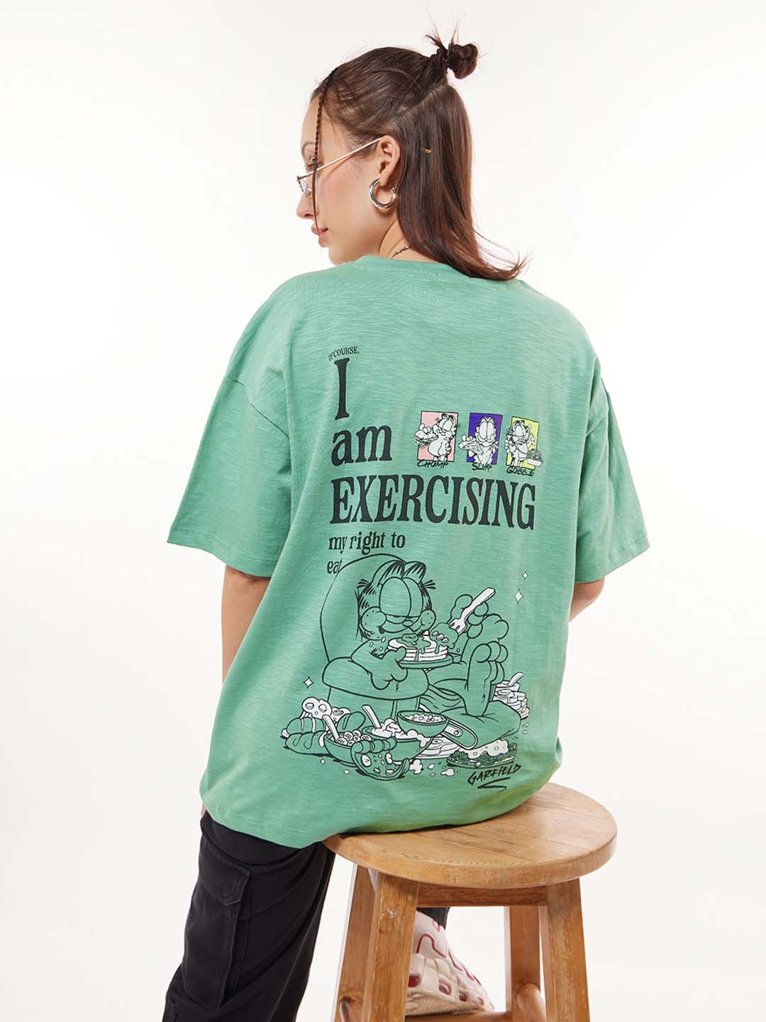 

Bewakoof Air 1.0 Women Green Exercising Garfield Graphic Printed Oversized T-shirt