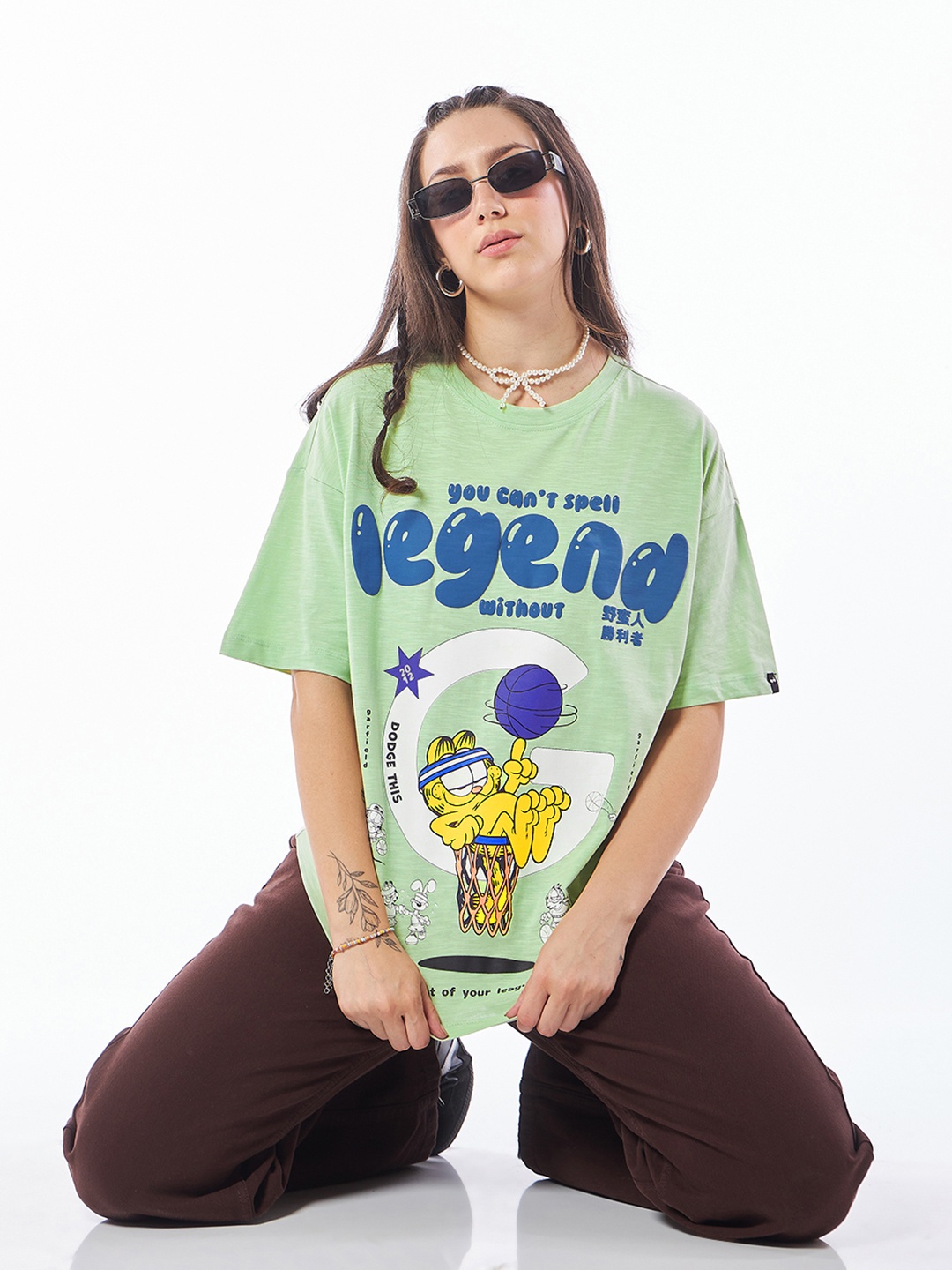 

Bewakoof Air 1.0 Women Green Spell Legend Graphic Printed Oversized T-shirt