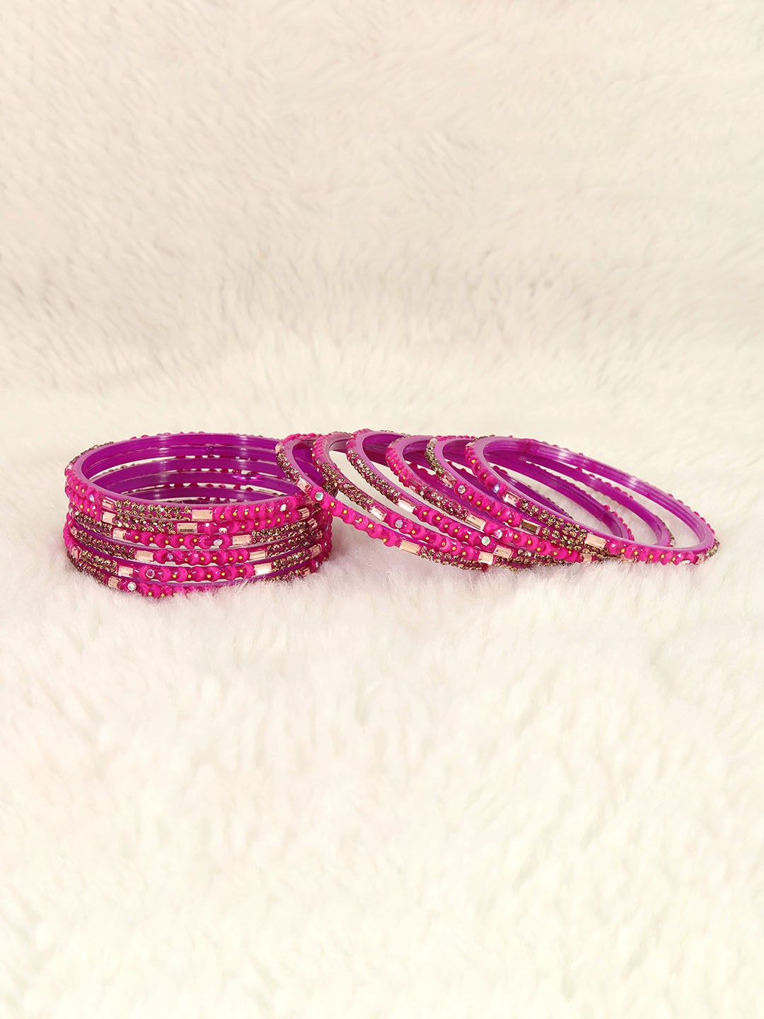 

LAVAZZA Set Of 12 Gold Plated Cubic zirconia Studded Bangles, Magenta