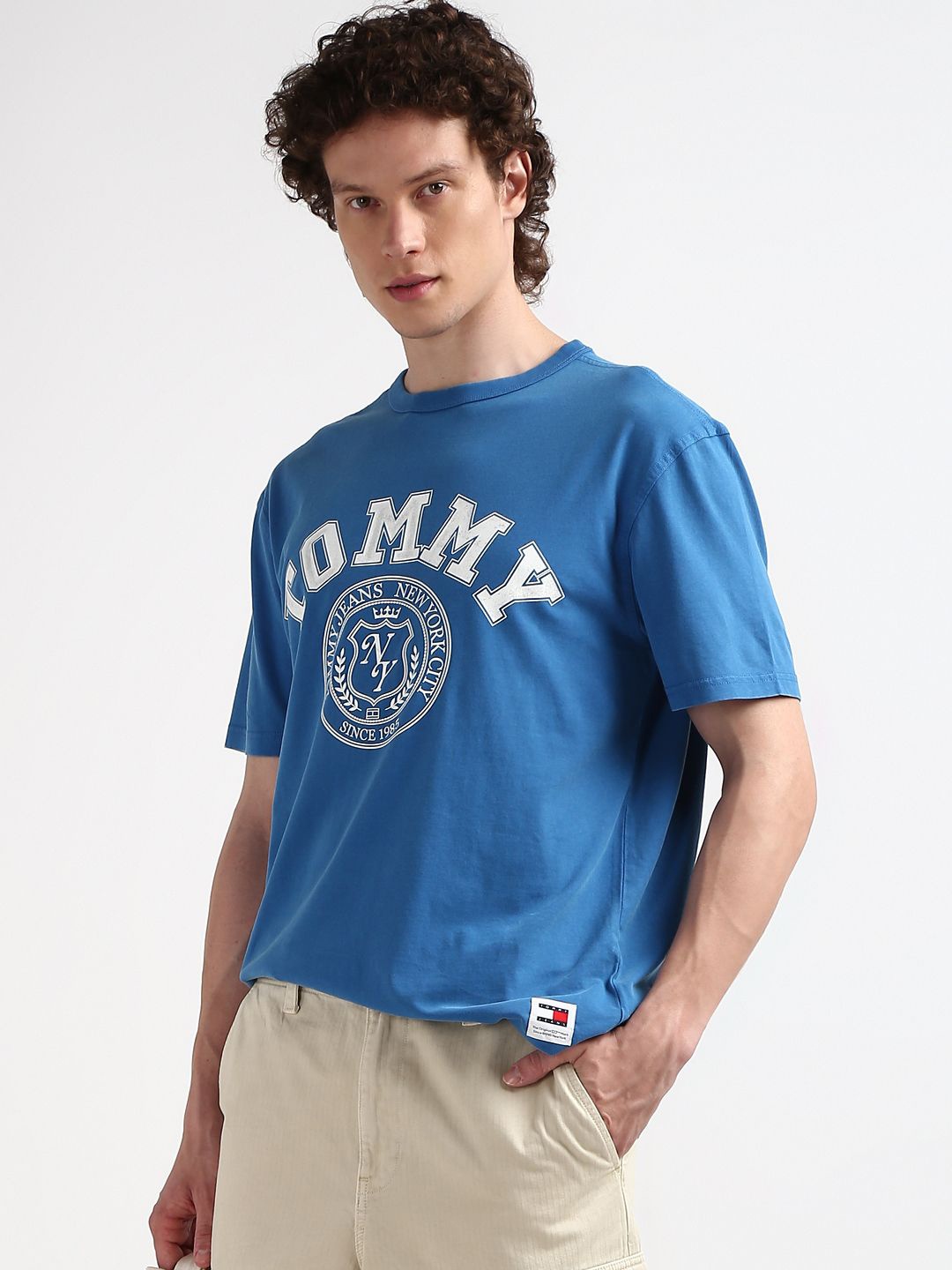 

Tommy Hilfiger Round Neck Short Sleeves Typographic Printed Cotton Regular Fit T-shirt, Blue