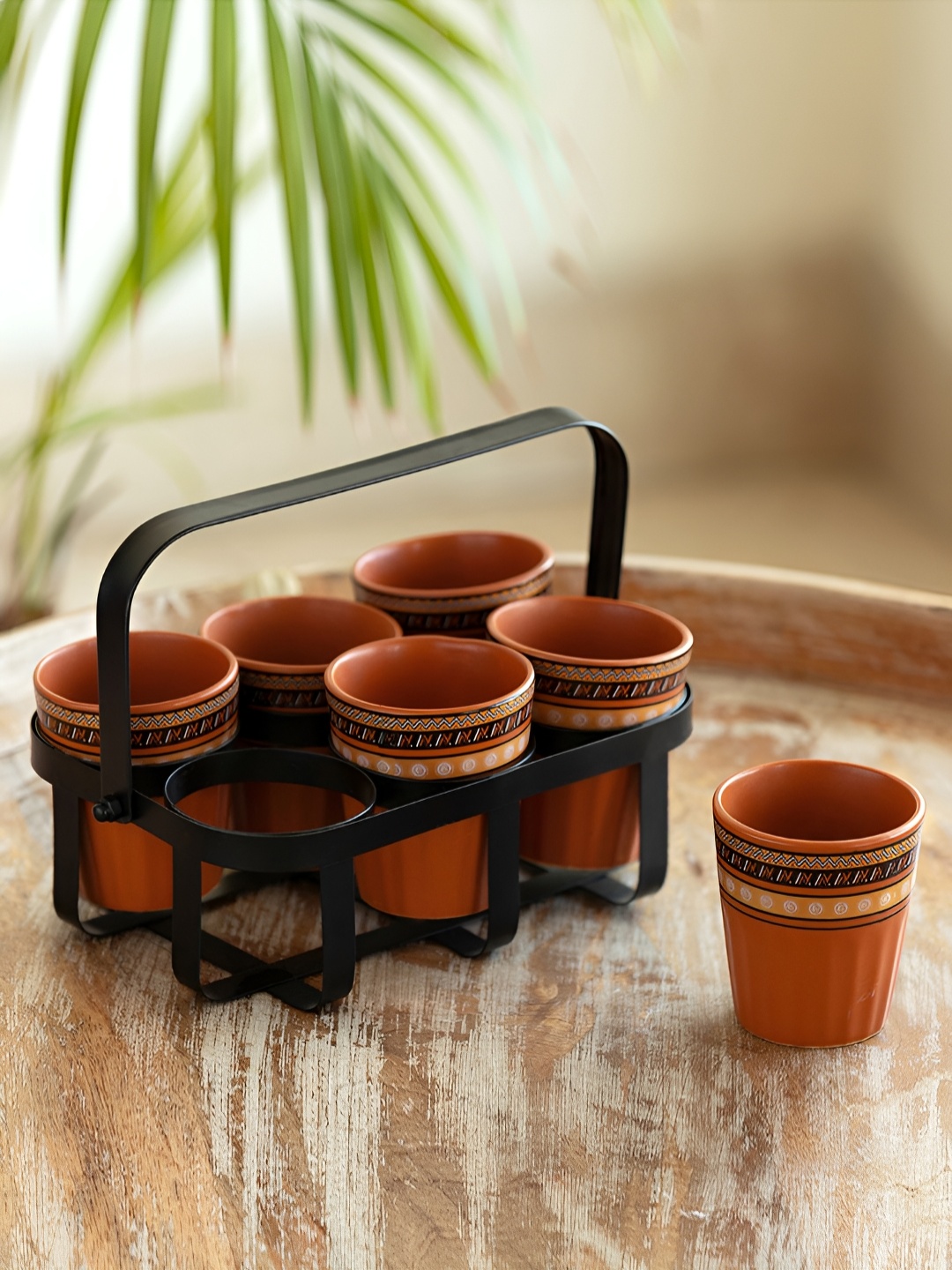 

ExclusiveLane Brown 6 Pieces Printed Ceramic Matte Finish Cups With Iron Holder 120ml Each