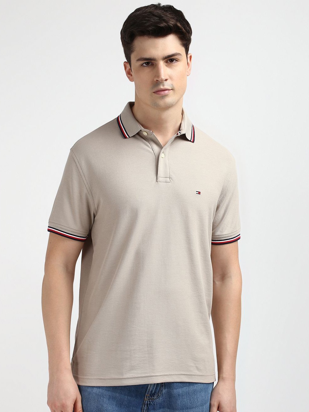 

Tommy Hilfiger Men Solid Polo Collar T-shirt, Beige