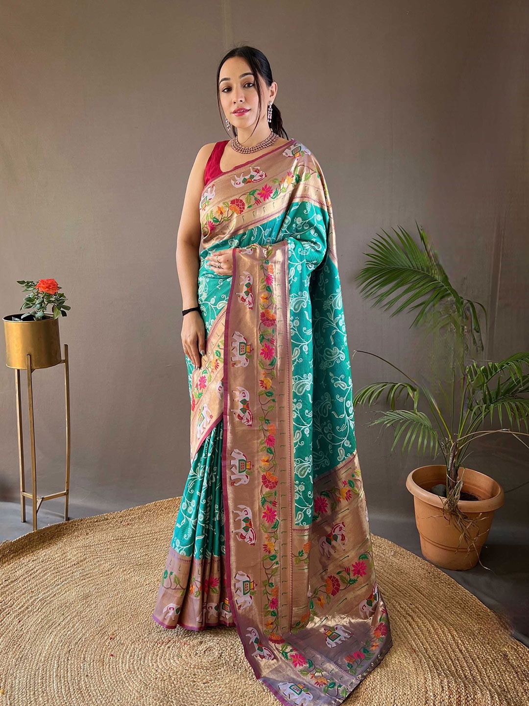 

Panzora Floral woven design Zari Paithani Saree, Teal