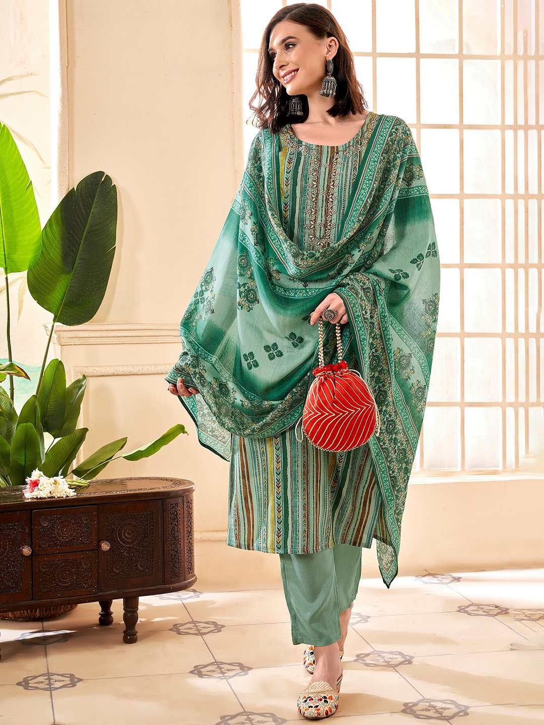 

Anouk Sea Green Ethnic Motif Printed Chanderi Silk Straight Kurta With Trousers & Duppatta