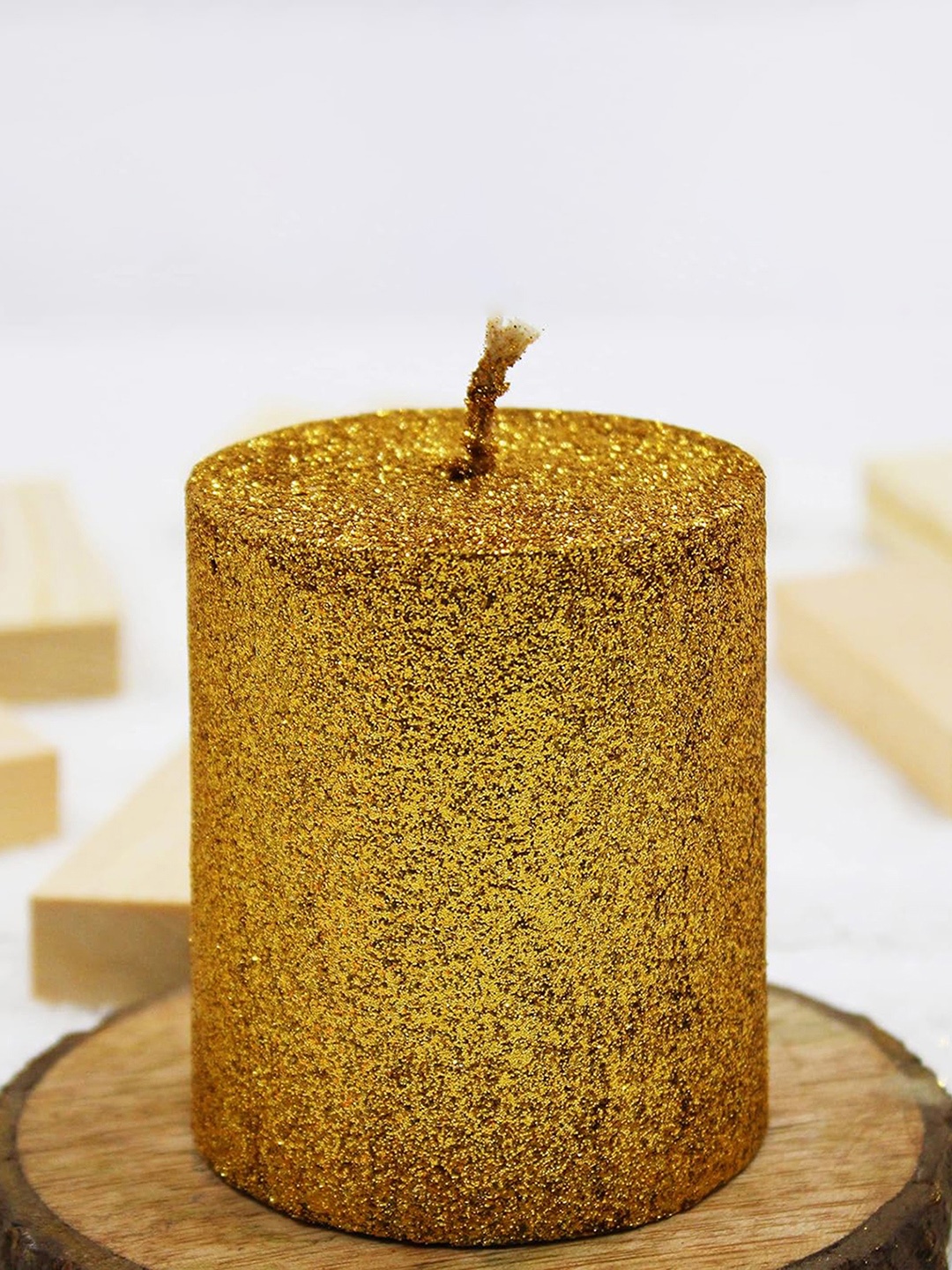 

atorakushon Gold-Toned Scented Paraffin Pillar Candle