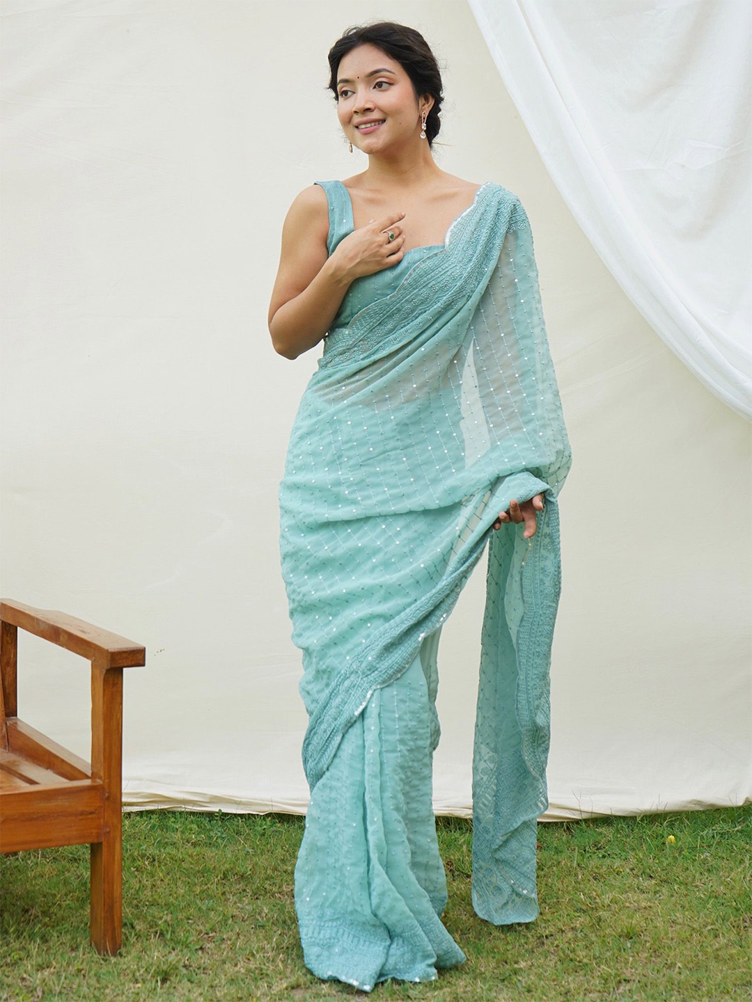 

elora Striped Sequinned Pure Georgette Saree, Turquoise blue